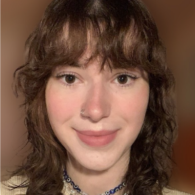 Headshot of woman with light brown hair.