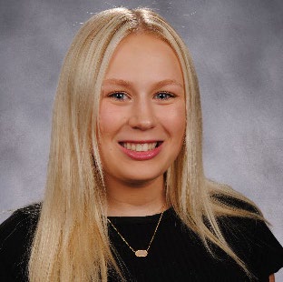 Headshot of a woman with blonde hair