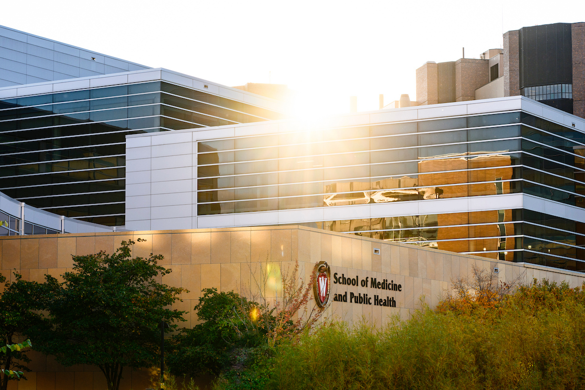 The sun flares above the Health Sciences Learning Center (HSLC), home to the School of Medicine and Public Health, on an autumn day at the University of Wisconsin–Madison on Oct. 29, 2025. 
